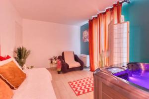 Appartements Suite Marilyn Monroe & SPA - 5P - Proche Disney : photos des chambres