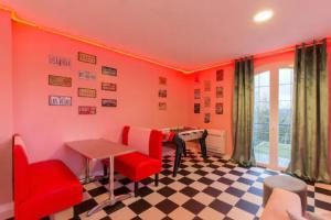 Appartements Suite Marilyn Monroe & SPA - 5P - Proche Disney : photos des chambres