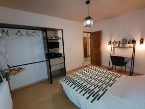 Appartements Appartement cosy style industriel : photos des chambres