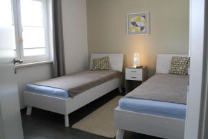 Ferienwohnung KWE 10 OG "Eikkater"