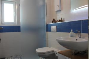 Ferienwohnung KWV11EG "Seefrosch im Küstenwald"