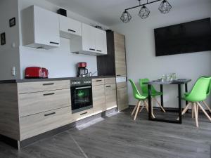 Ferienwohnung KWi 87 EG "Boompicker"