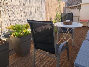 Appartements Appartement avec terrasse : photos des chambres