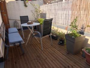 Appartements Appartement avec terrasse : photos des chambres