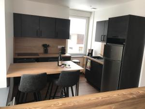 Appartements Le Duplex : photos des chambres