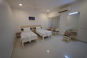 Hotel Palmyra Grand Inn