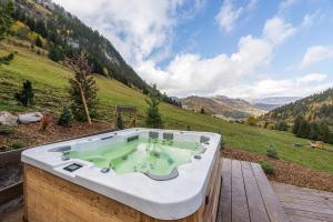 Chalets Le Lodge Rodzina, Luxueux chalet jacuzzi 12-14pers, LLA Selections by LocationlacAnnecy : photos des chambres