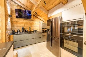 Chalets Le Lodge Rodzina, Luxueux chalet jacuzzi 12-14pers, LLA Selections by LocationlacAnnecy : photos des chambres