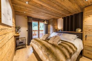 Chalets Le Lodge Rodzina, Luxueux chalet jacuzzi 12-14pers, LLA Selections by LocationlacAnnecy : photos des chambres