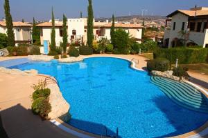 Three-Bedroom Junior Villa with Shared Pool room in Aphrodite Hills Golf & Spa Resort Residences - Junior Villas
