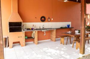 Casa com piscina a 350m da praia em Boiçucanga