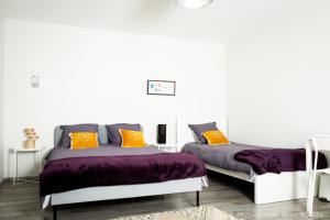 Appartements 1 CHAMBRE 20m2 : 2 lits pour 3 voyageurs +cuisine + terrasse bois en jardin : photos des chambres