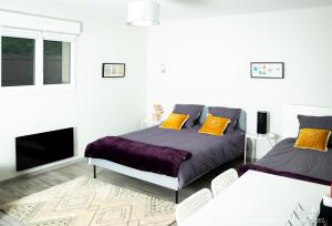 Appartements 1 CHAMBRE 20m2 : 2 lits pour 3 voyageurs +cuisine + terrasse bois en jardin : photos des chambres