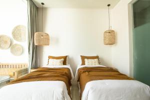 Pelangi 148 Beach Suites