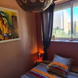 Appartements Appartement Domloc : photos des chambres