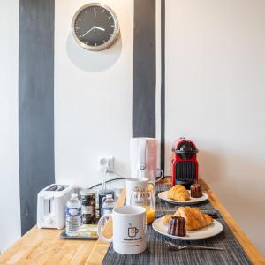 Appartements Aux portes de Bordeaux Le Golden Gate MindUrGuest : photos des chambres