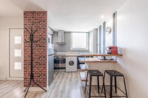Appartements Aux portes de Bordeaux Le Golden Gate MindUrGuest : photos des chambres