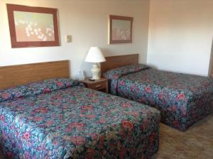 Standard Queen Room with Two Queen Beds room in Downtown Motel