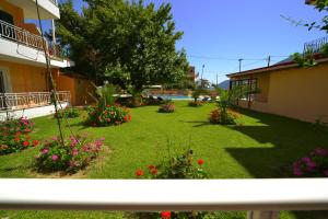 Quadruple Room  Ground Floor with Garden and Pool View
