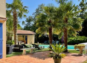 Maisons d'hotes Les trois cedres : Cottage - Vue sur Jardin