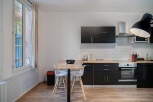 Appartements Le Petit Bouchon de Troyes classe 3 etoiles : photos des chambres