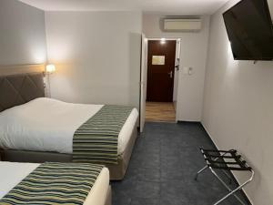 Hotels Hotel Village Motel : photos des chambres