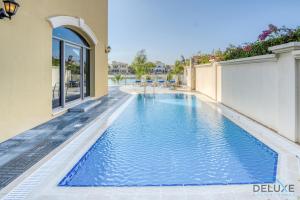 Breath-taking 5BR Villa with Assistants Room and Private Pool in Frond E Palm Jumeirah by Deluxe Holiday Homes