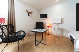 Appartements Appart Hotel Eugenie : photos des chambres