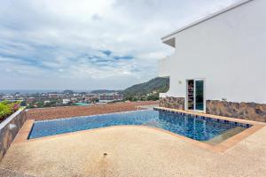Kata Ocean View condominium by Lofty
