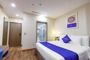 Phòng Loại Sang Giường Đôi Hướng Vườn (Deluxe Double Garden View)