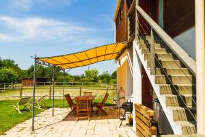 Appartements Les Jardins de La Palaire - Gite T2 avec jardin : photos des chambres