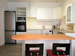 Appartements Gite des Halles - gitesdesbalcons-com : photos des chambres