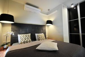 DOBRUK APARTAMENTY Jan w hotelu Royal Tulip Sand