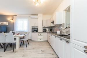 Holiday Home Tower with private pool, sauna and quads