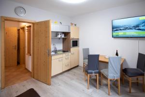 Apartmenthaus HAUS Gipfelglück Apartment KUAFSTOA