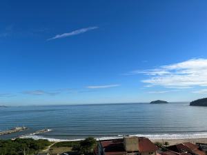 Apartamento novo frente mar com piscina em Home Club