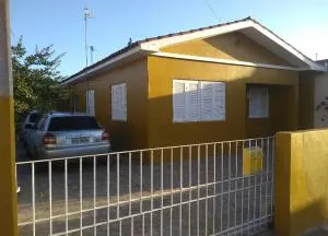 Casa Yellow I Próxima a praça central - Cristal