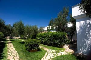 Ferienwohnung ulivo mit Pool und Privatstrand