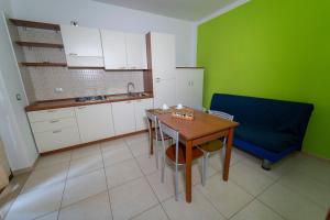 Ferienwohnung ulivo mit Pool und Privatstrand