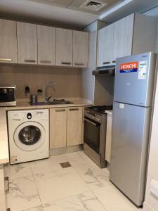 Cozy 1-bedroom apartment in Dubai South with Pool