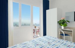 Family Room with Balcony and Sea View room in Hotel Manila