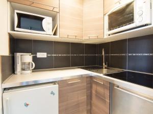 Appartements Apartment Pegase Phenix-15 by Interhome : photos des chambres