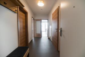 Ferienwohnung Bergsonne mit Sonnenbalkon und Tiefgaragen Parkplatz