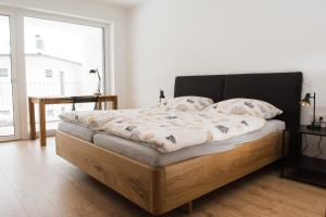 Ferienwohnung Bergsonne mit Sonnenbalkon und Tiefgaragen Parkplatz