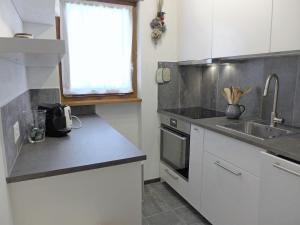 Apartment Chesa Arlas A1 by Interhome