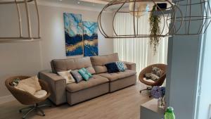 Meia Praia Apto Fino Acabamento 3 suítes e 2 garagens