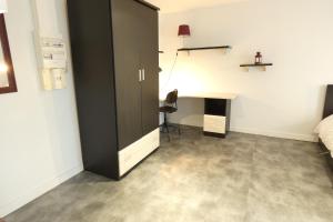 Appartements Meilh - Studio cosy tout equipe 10 min centre ville : photos des chambres