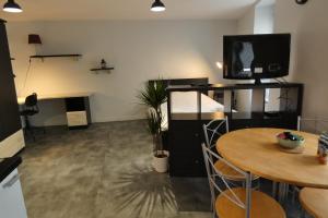 Appartements Meilh - Studio cosy tout equipe 10 min centre ville : photos des chambres