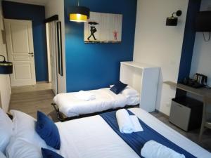 Hotels Les Remparts : photos des chambres