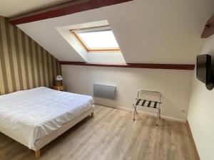 Appartements Les 4 flocons, avec piscine exterieure chauffee a 100m du lac et du centre , wifi, parking, sauna : photos des chambres